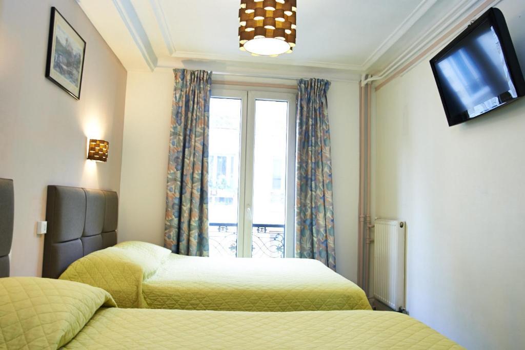 Hotel Luxor Issy-les-Moulineaux Habitación foto